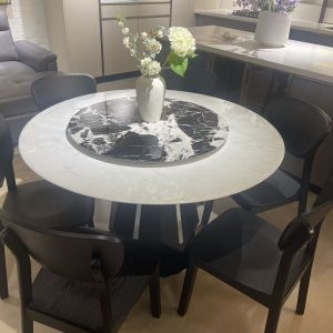 1.3m Round Stone Dining Table with Black Chairs
